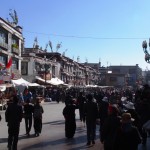 Street scene in the old town. Tibetans walking clockwise (of course); Chinese walking anti clockwise (of course)